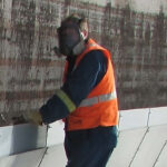 Image of in-service inspection for Sandborn's IFR System, with technicians checking and maintaining components for proper operation and safety